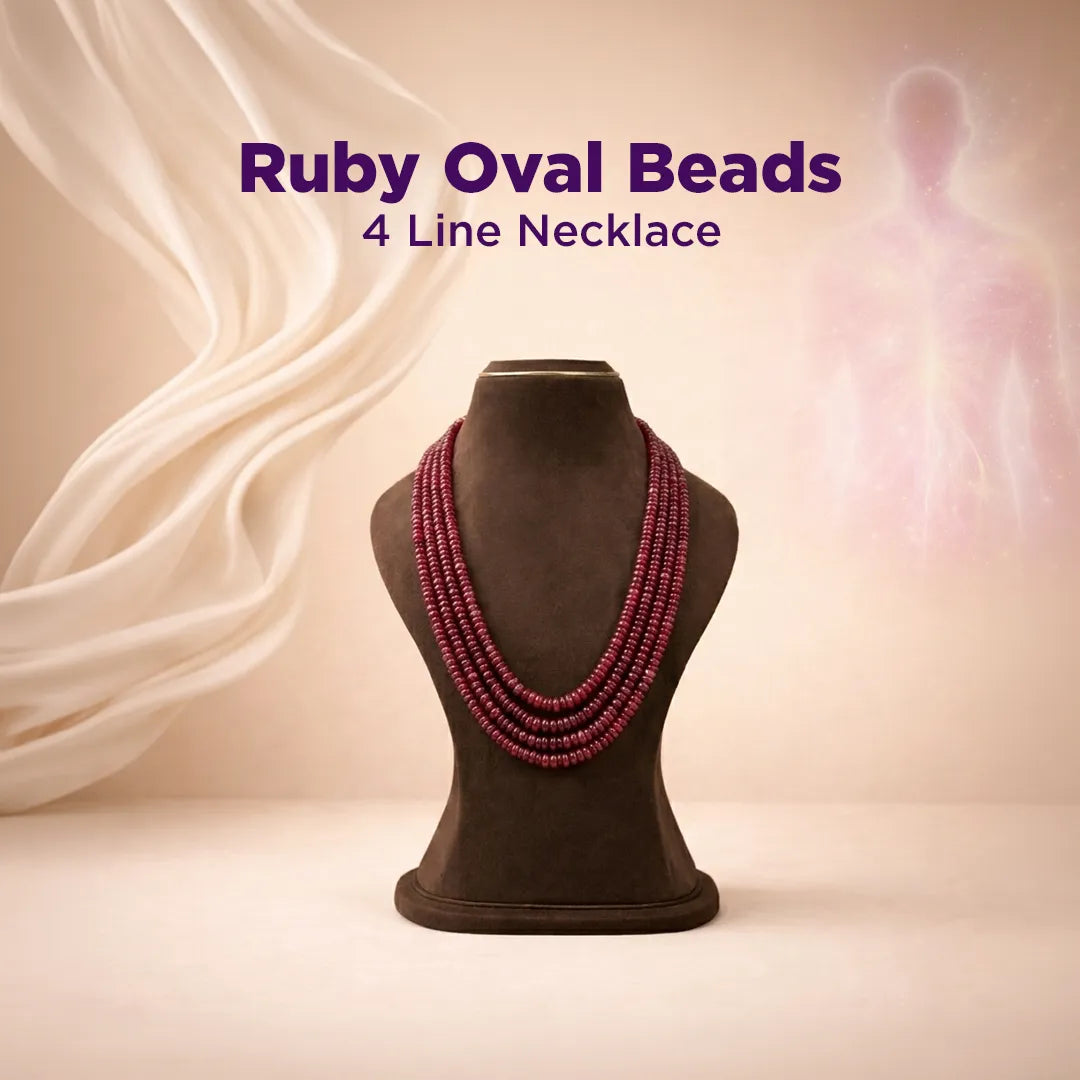Ruby oval beads 4 line necklace on a mannequin with a soft beige background