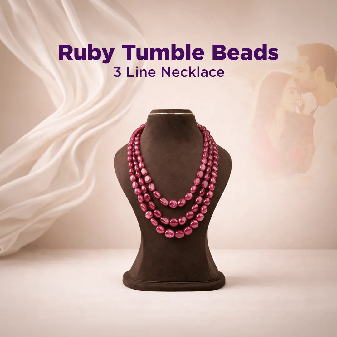 Ruby tumble beads necklace on a mannequin with a soft background