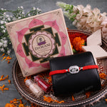 Sacred Mahadev Rakhi crafted from 925 Sterling Silver with adjustable red thread and festive floral background.