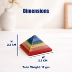 Colorful pyramid-shaped object with dimensions and weight information on a white background