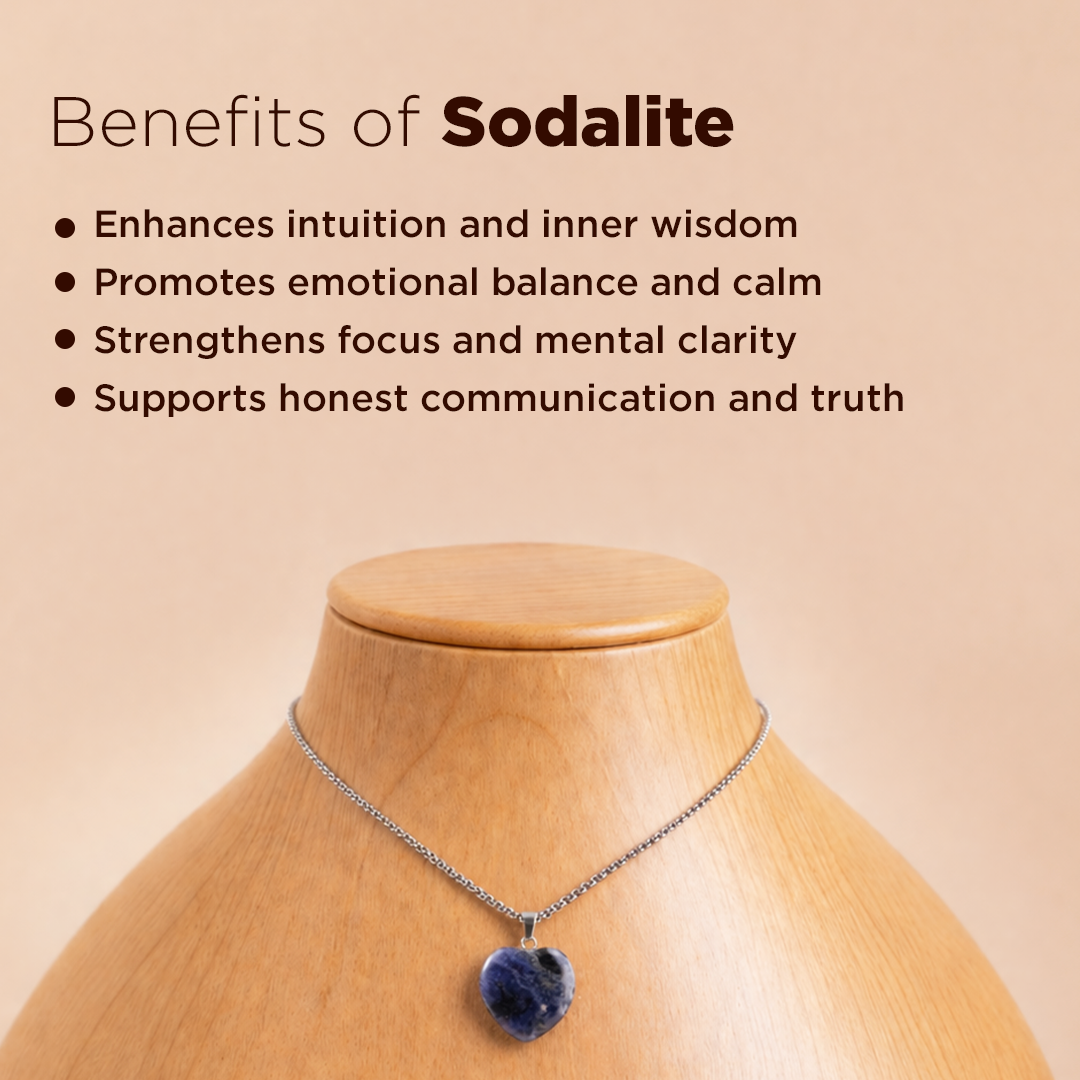 Necklace with sodalite pendant on a wooden mannequin against a beige background with text about sodalite benefits.Sodalite Heart Pendant (Abhimantrit) for Clarity & Communication