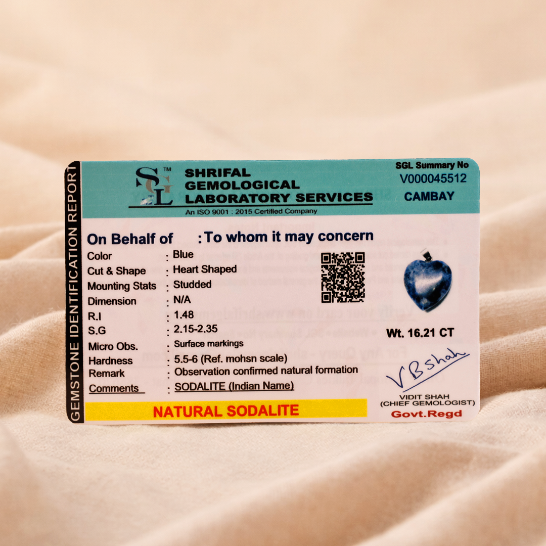 Shrilal Gemological Laboratory Services identification card on a beige background
