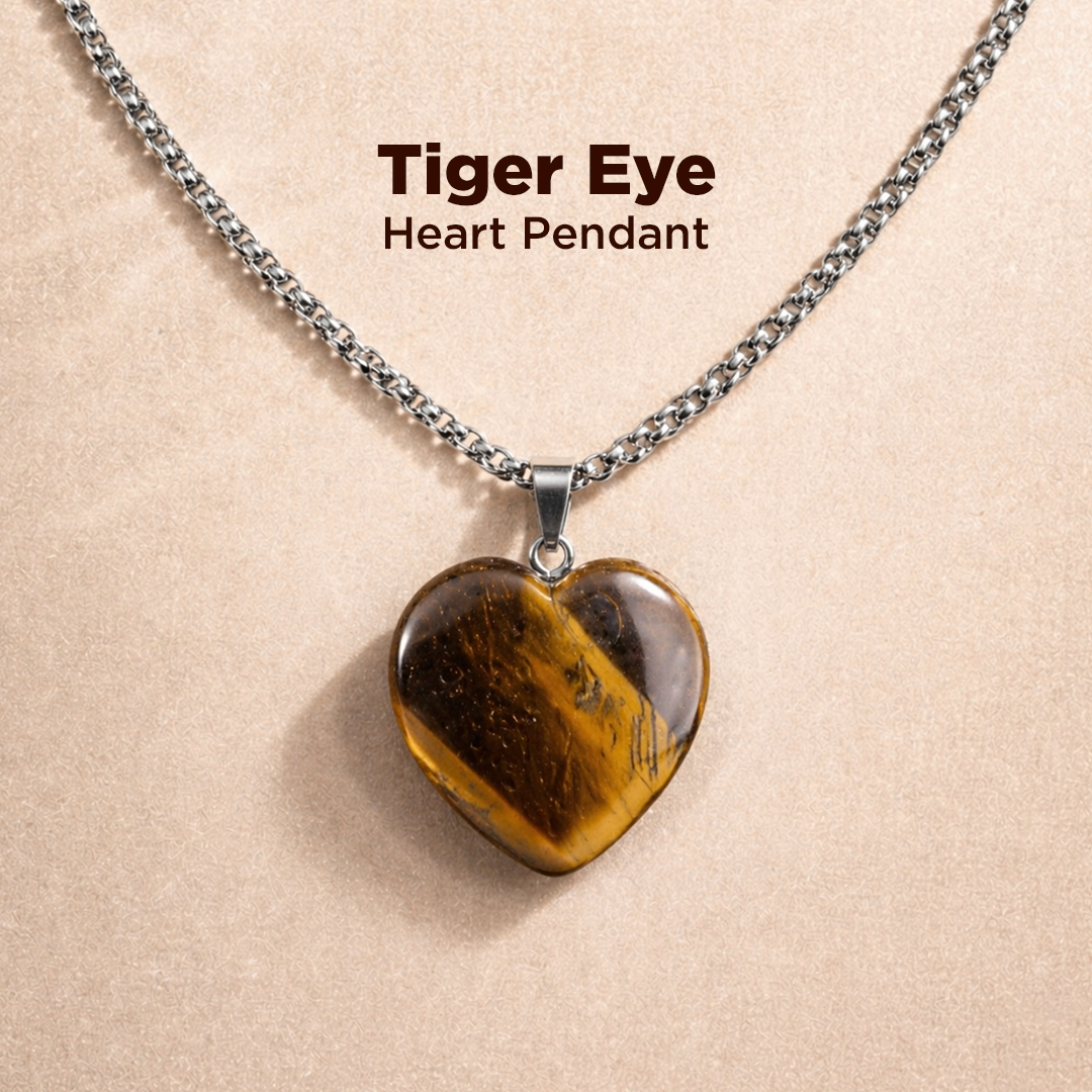 Tiger Eye heart pendant necklace on a beige background