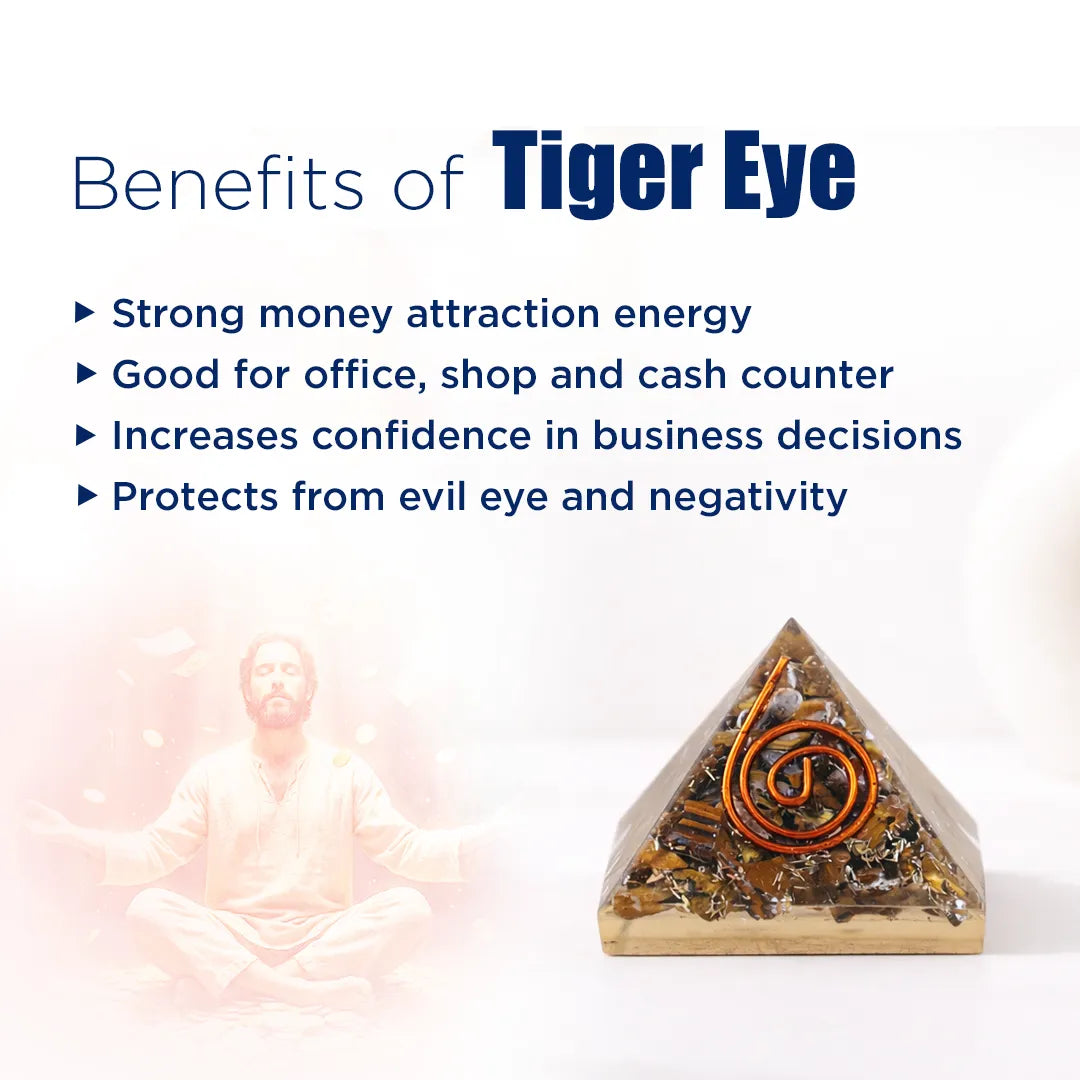 Tiger eye crystal pyramid with benefits listed on a white background