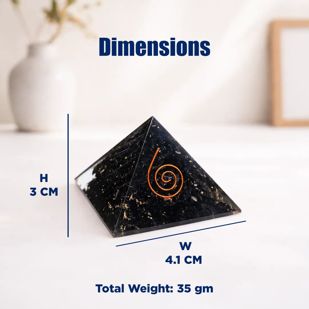 Pyramid-shaped object with spiral design on a white surface, showing dimensions and weight.