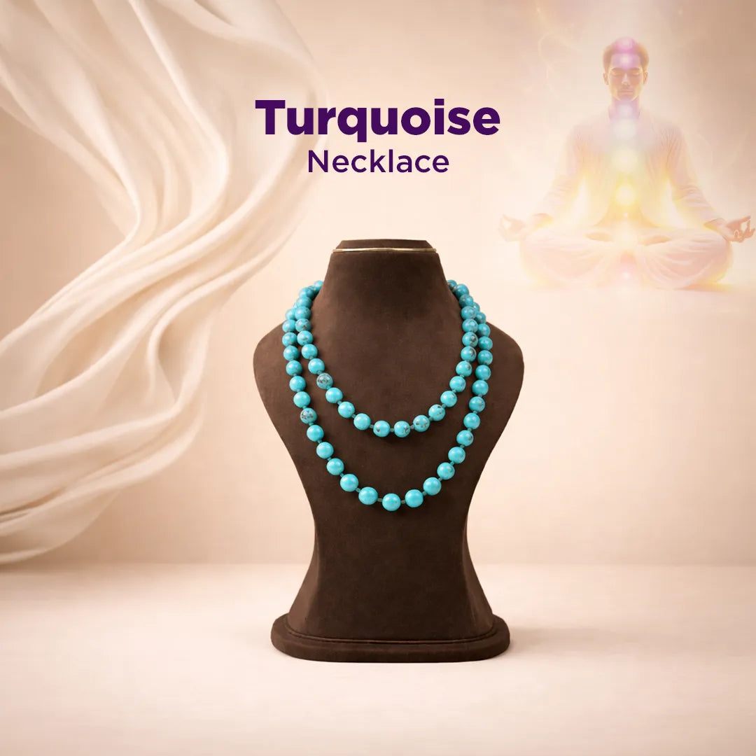 Turquoise necklace on a brown mannequin with a soft, blurred background