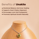 Unakite necklace on a wooden mannequin with benefits listed on a beige background