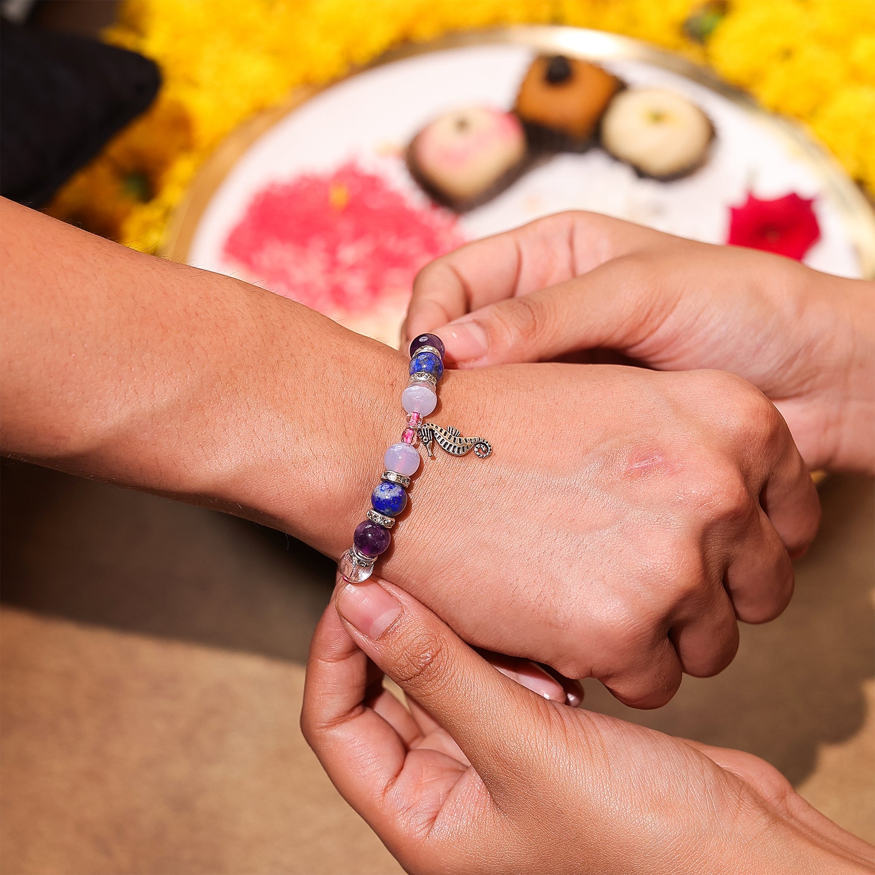 Clear , evil eye ,rose rakhi - Abhimantrit