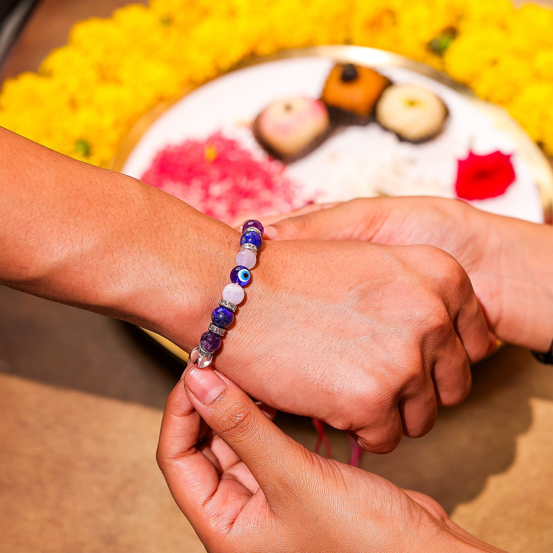 Clear , evil eye ,rose rakhi - Abhimantrit
