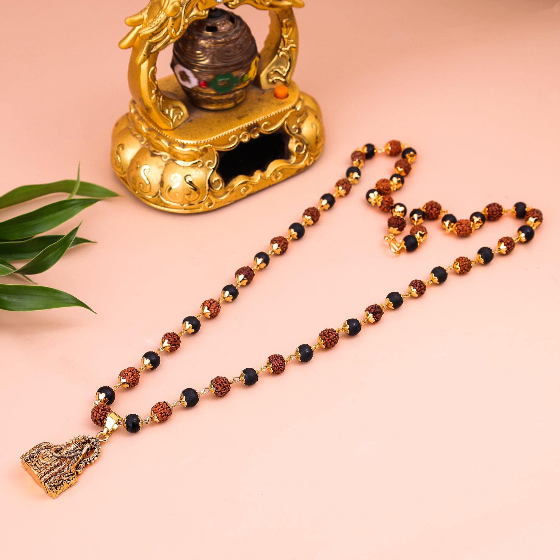 Golden Karungali Rudraksha Mala with Mahadev Jyotirling Golden Karungali Rudraksha Mala with Mahadev Jyotirling - Abhimantrit