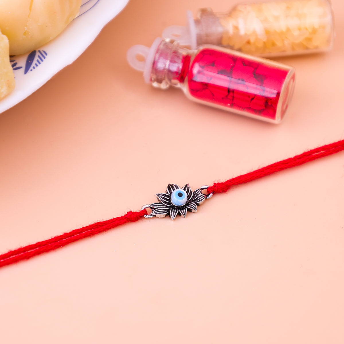 92.5 Pure Silver Lotus With Evil Eye Rakhi