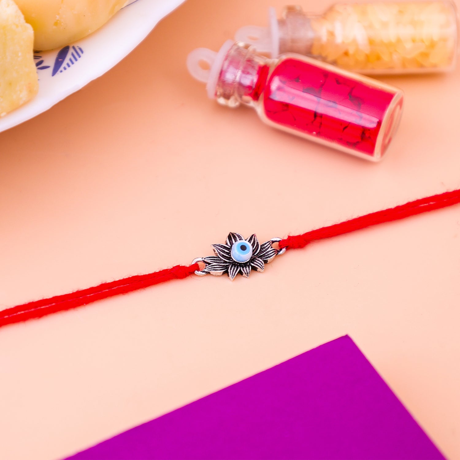 92.5 Pure Silver Lotus With Evil Eye Rakhi