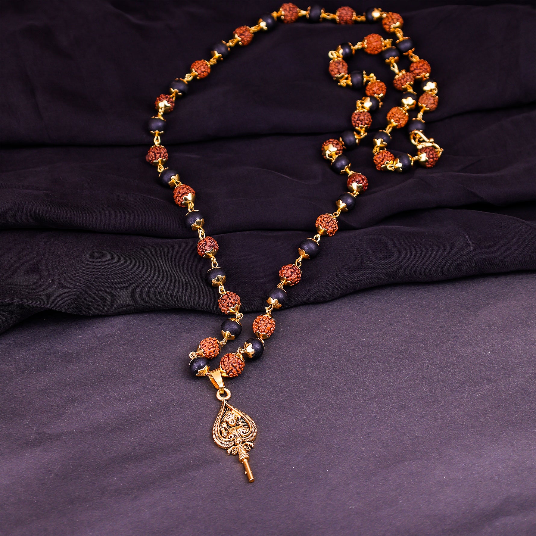 Golden Karungali Rudraksha Mala Murugan Trishul Golden Karungali Rudraksha Mala Murugan Trishul - Abhimantrit