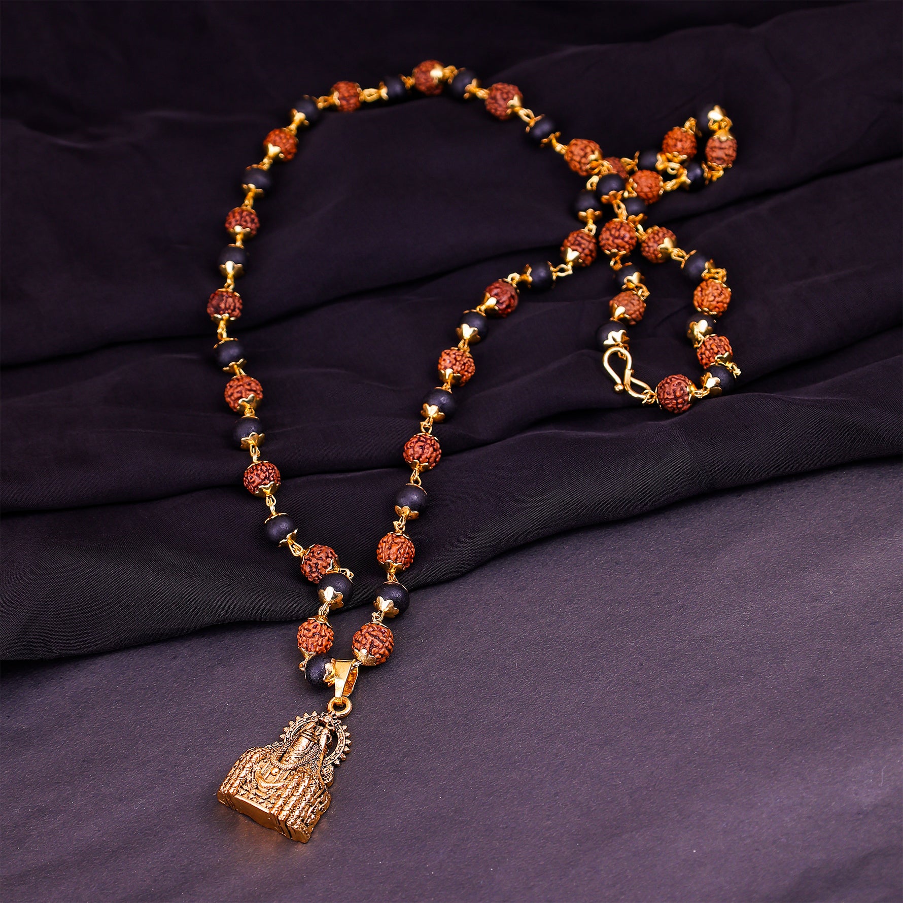 Golden Karungali Rudraksha Mala with Mahadev Jyotirling Golden Karungali Rudraksha Mala with Mahadev Jyotirling - Abhimantrit