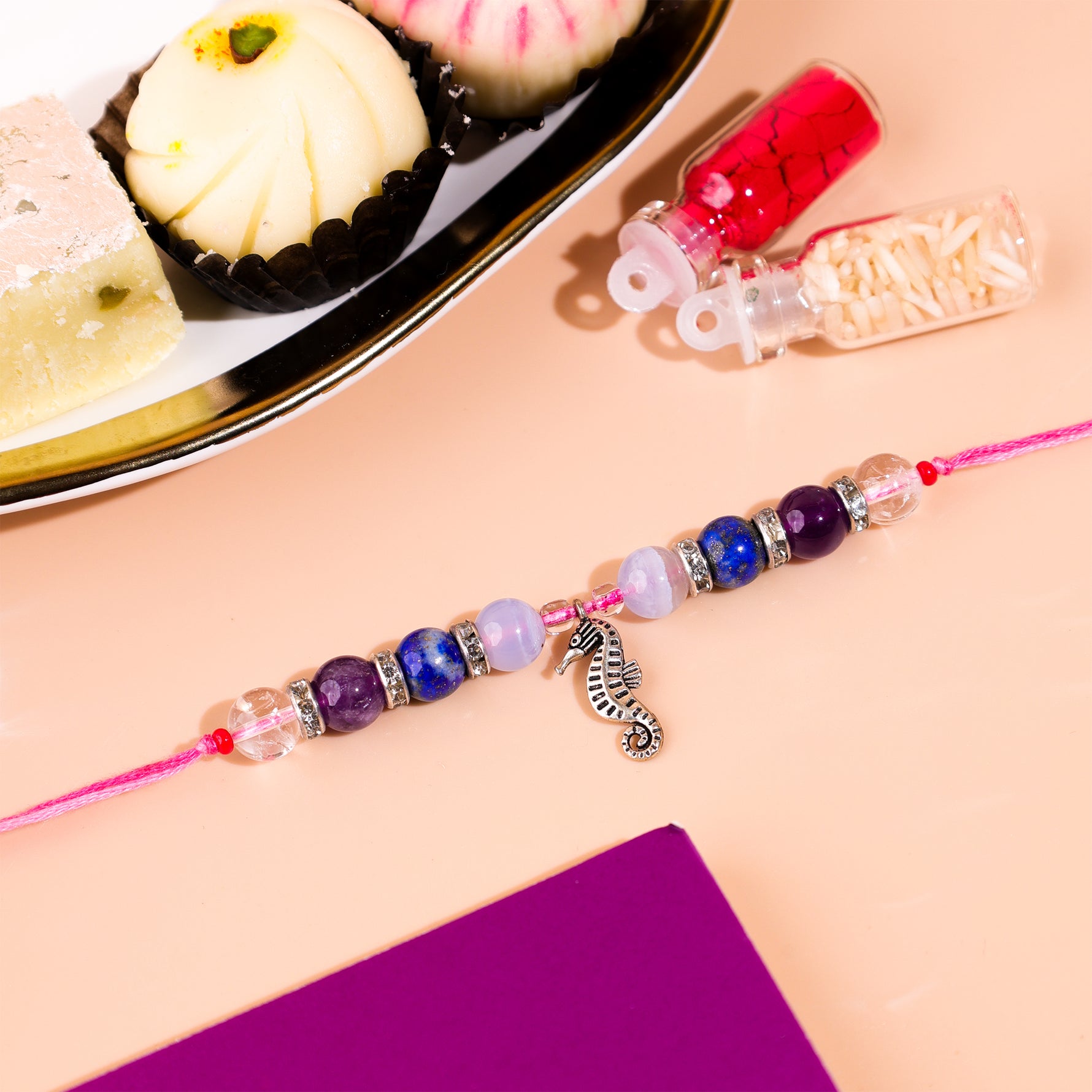 Clear , evil eye ,rose rakhi - Abhimantrit