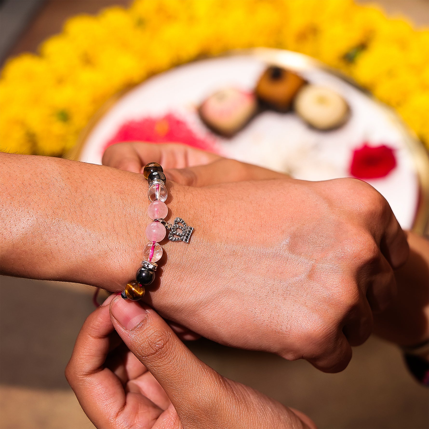 Rose quatz and tiger eye combo rakhiRose quatz and tiger eye combo rakhi - Abhimantrit