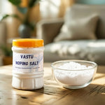 Jar of VASTU Moping Salt on a wooden surface with a blurred living room background