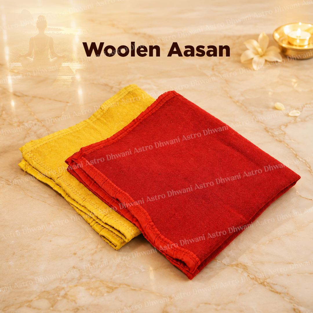 Two folded woolen cloth aasan in red and yellow are displayed on a beige marble surface with decorative props and the text 'Woolen Aasan' at the top.