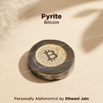 A round black and gold Bitcoin coin sculpture on a beige background with text reading 'Pyrite Bitcoin'.