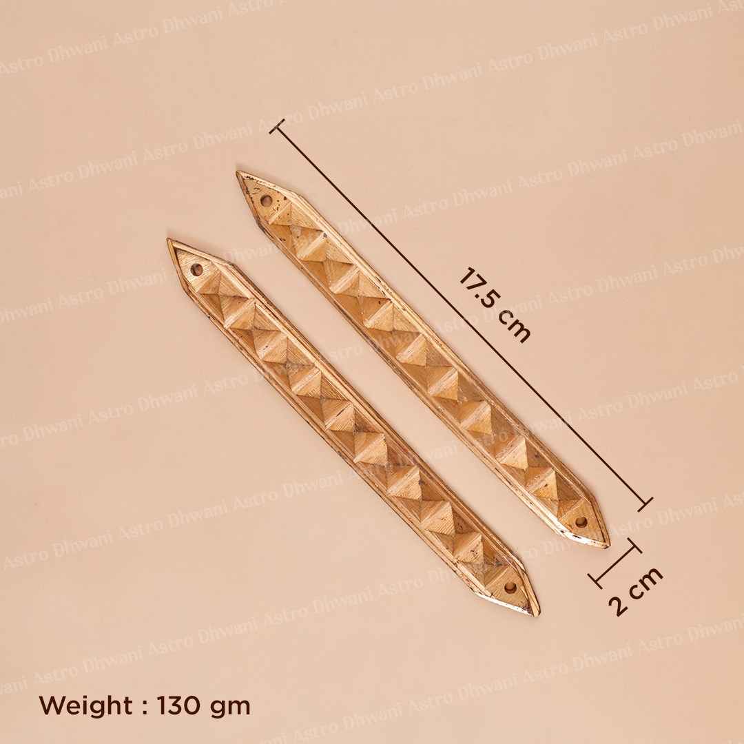 Two metallic gold-toned decorative hardware pieces with a textured pyramid pattern, shown on a beige background with dimension lines indicating 17.5 cm length and 2 cm width, plus weight text reading 130 gm.