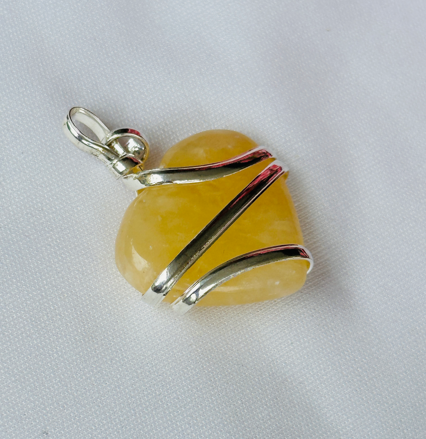 Fulfill Your Desires with Divine Blessings: Yellow Aventurine Heart Wrapped Pendant - Abhimantrit & Certified