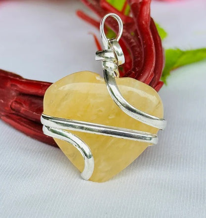 Fulfill Your Desires with Divine Blessings: Yellow Aventurine Heart Wrapped Pendant - Abhimantrit & Certified