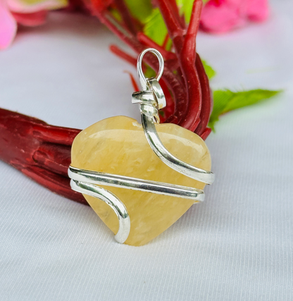 Fulfill Your Desires with Divine Blessings: Yellow Aventurine Heart Wrapped Pendant - Abhimantrit & Certified