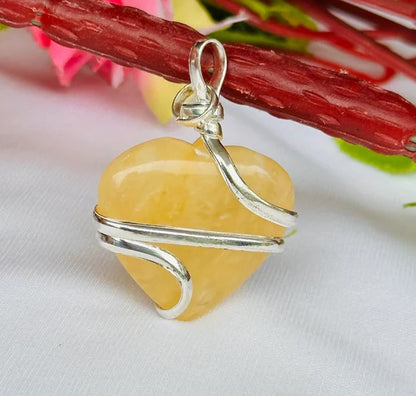 Fulfill Your Desires with Divine Blessings: Yellow Aventurine Heart Wrapped Pendant - Abhimantrit & Certified