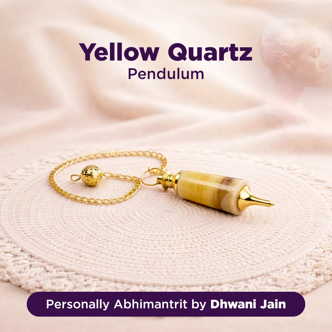 Yellow Quartz Pendulum on a textured surface with branding text.