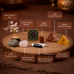 Collection of crystals and spiritual items on a wooden surface with labels.